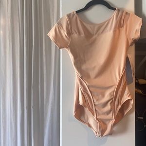 New danskin bodysuit with tags